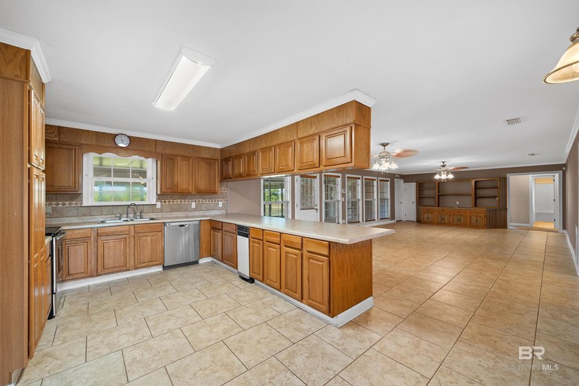 Located in a rural setting in Foley, 17635 Charolais Rd offers - photo 10