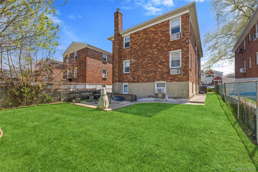 Spacious and well-maintained legal two-family home located in - photo 2