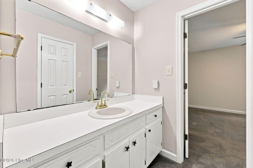 This 3-bedroom, 2-bath home offers fresh paint and newer carpet - photo 22