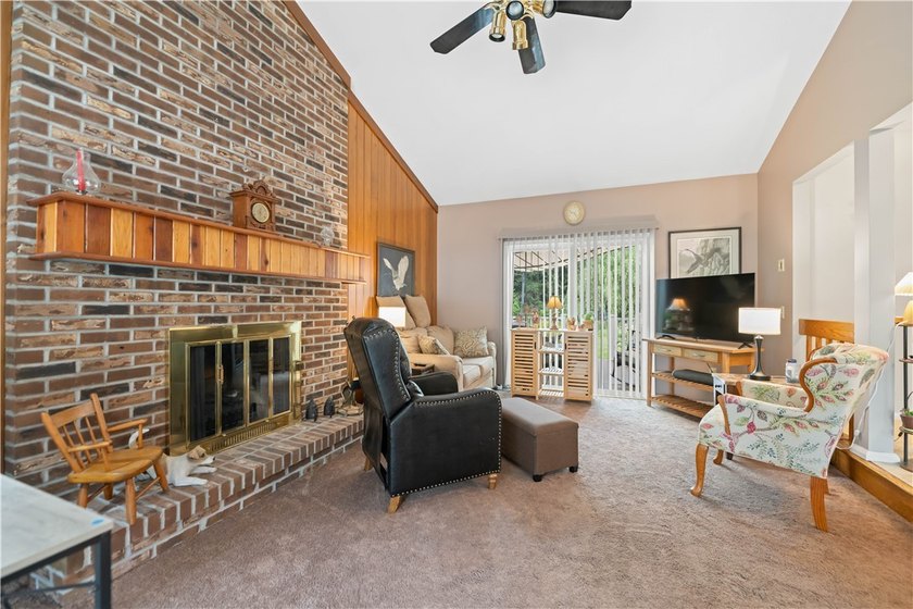 Nestled on a 1.34-acre lot in Webster, this spacious 5-bedroom - photo 3
