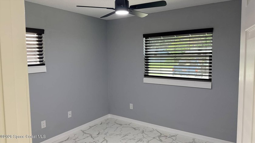 Beautifully remodeled concrete block 4/2 home with a new metal - photo 14