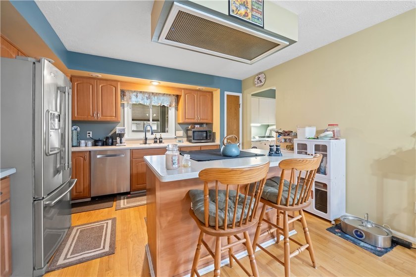 Nestled on a 1.34-acre lot in Webster, this spacious 5-bedroom - photo 8