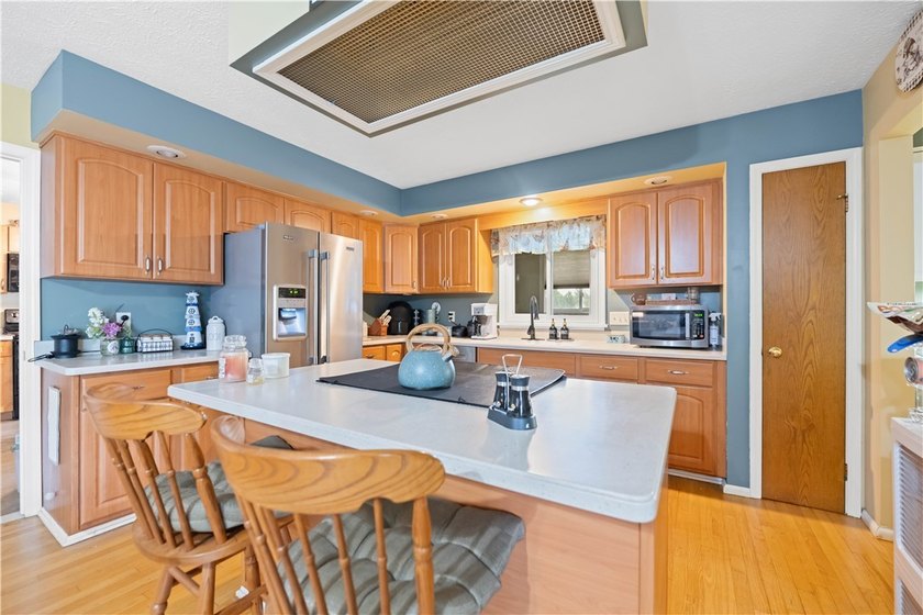 Nestled on a 1.34-acre lot in Webster, this spacious 5-bedroom - photo 9