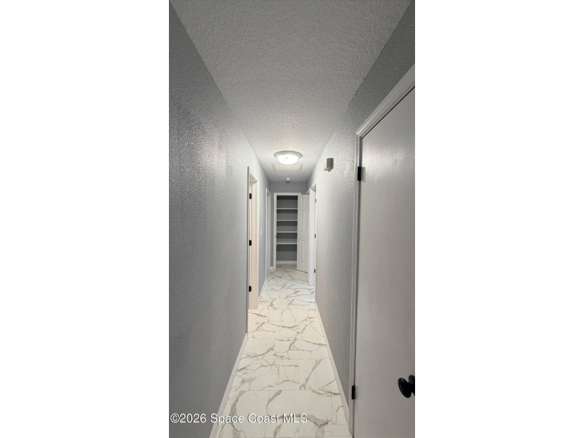 Beautifully remodeled concrete block 4/2 home with a new metal - photo 23