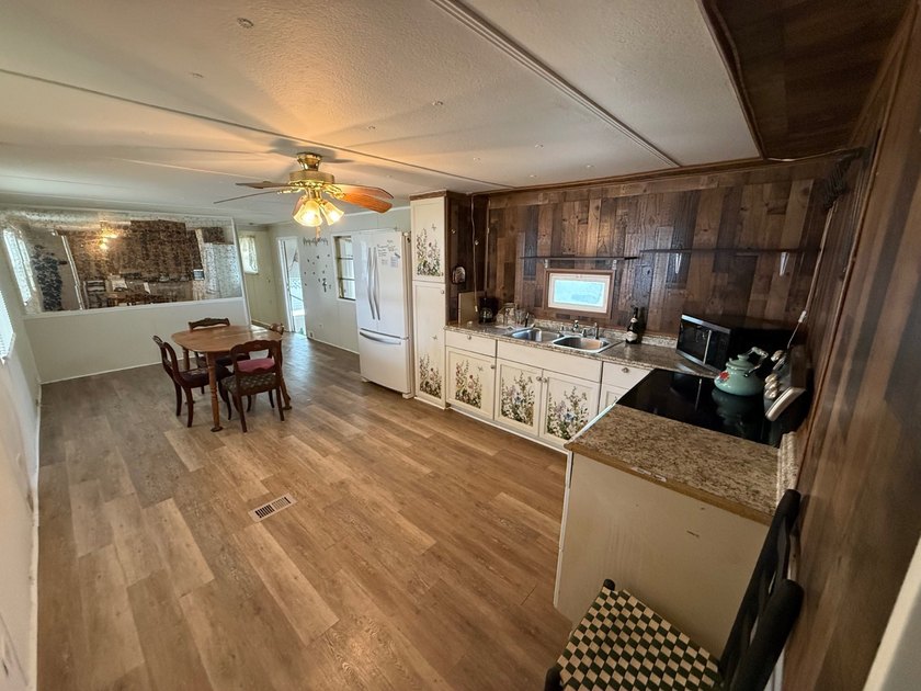 55+ Community. LOW LOT RENT: $688 a month. Includes water, sewer - photo 6