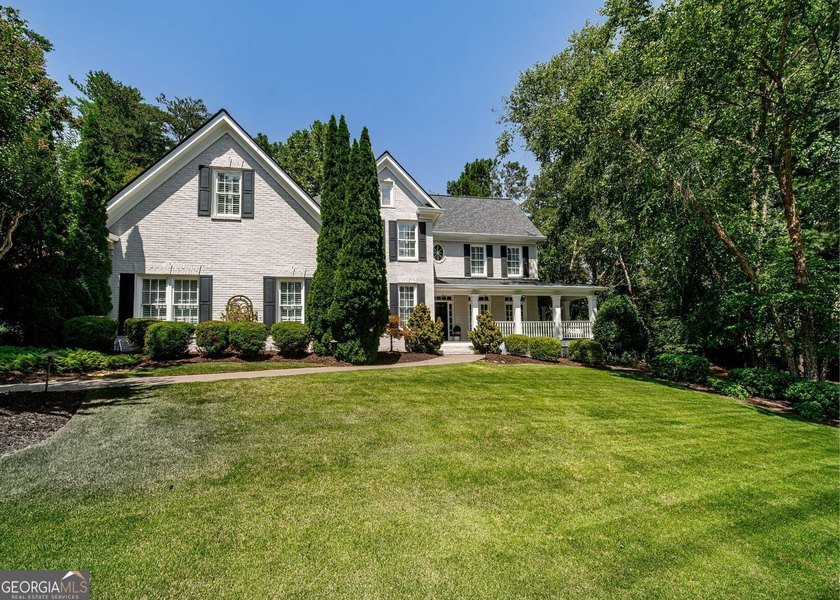 Welcome to 705 Clubside Drive, an exceptional four sided brick - photo 2