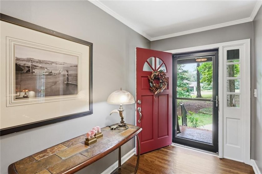 FLAWLESSLY updated 4 sided brick ranch on a GORGEOUS level lot - photo 4