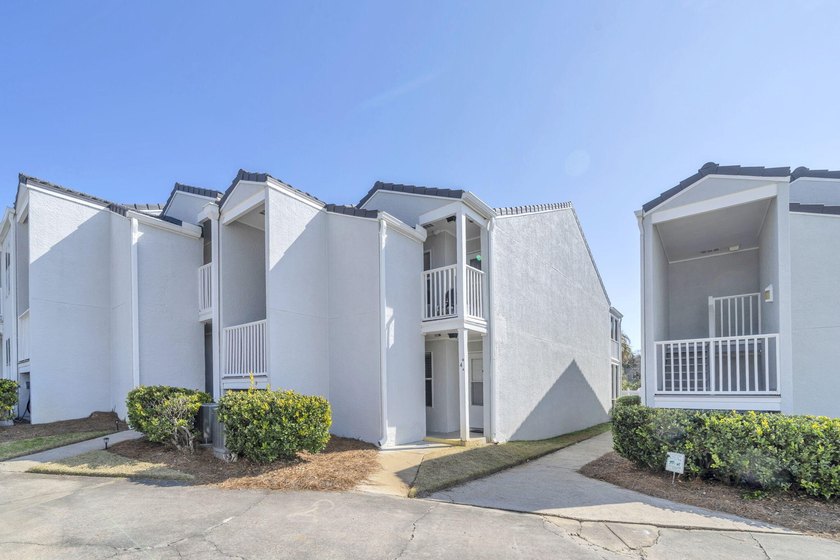 Nestled in a private, gated, low-density coastal community with - photo 3