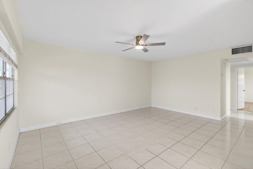 Located on the third and top floor with no neighbors above and - photo 11