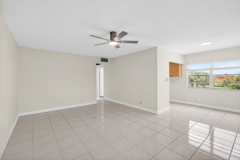 Located on the third and top floor with no neighbors above and - photo 12