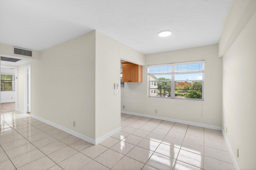 Located on the third and top floor with no neighbors above and - photo 13