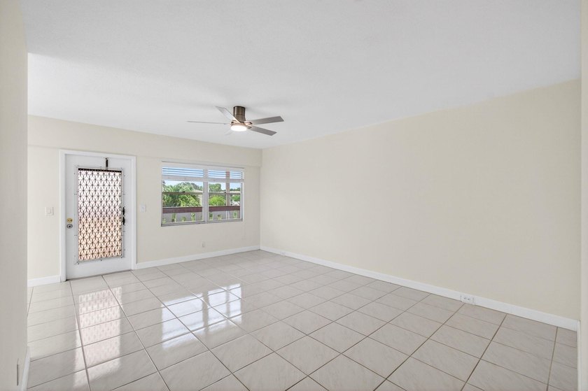 Located on the third and top floor with no neighbors above and - photo 15