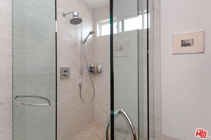 $50,000 Price Adjustment. Stunning light-filled, renovated end - photo 21
