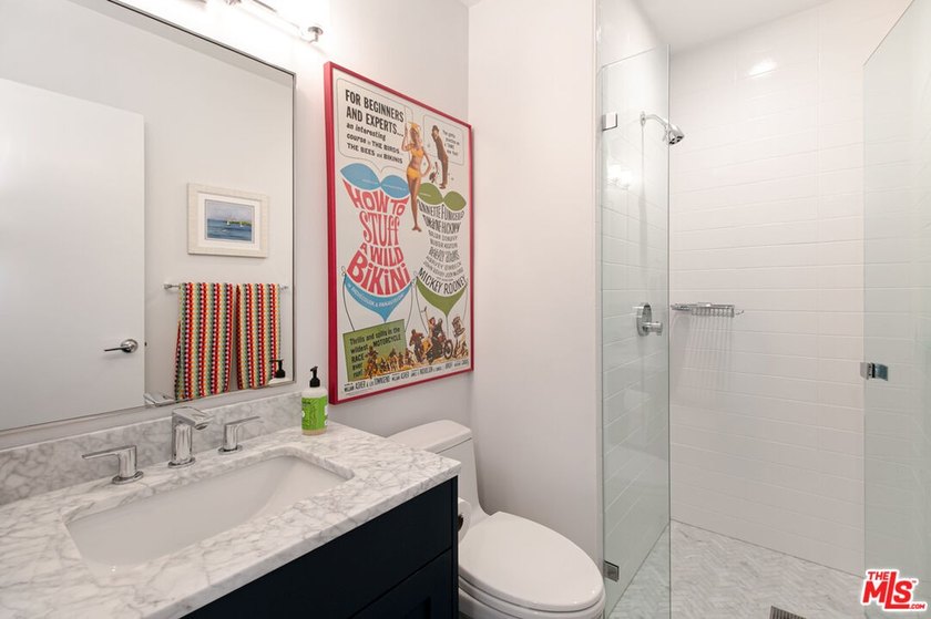 $50,000 Price Adjustment. Stunning light-filled, renovated end - photo 26