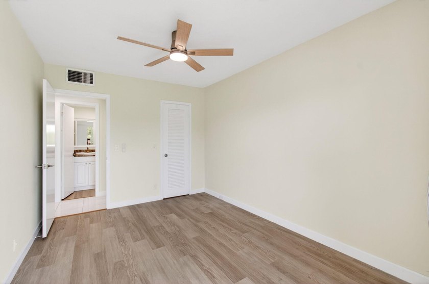 Located on the third and top floor with no neighbors above and - photo 34