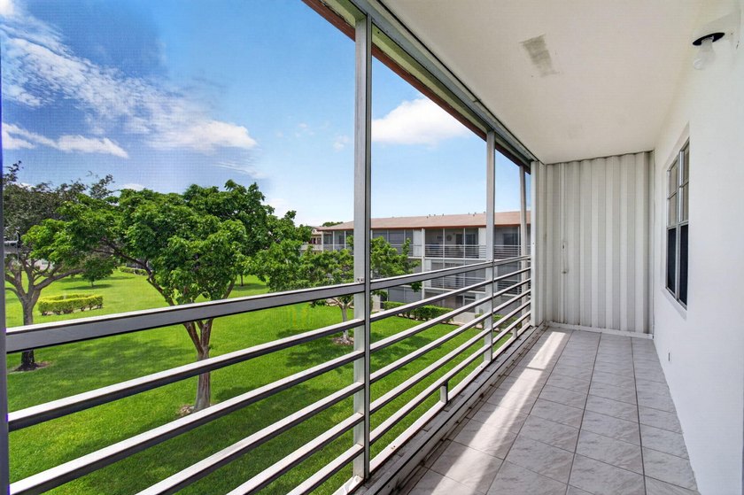 Located on the third and top floor with no neighbors above and - photo 35