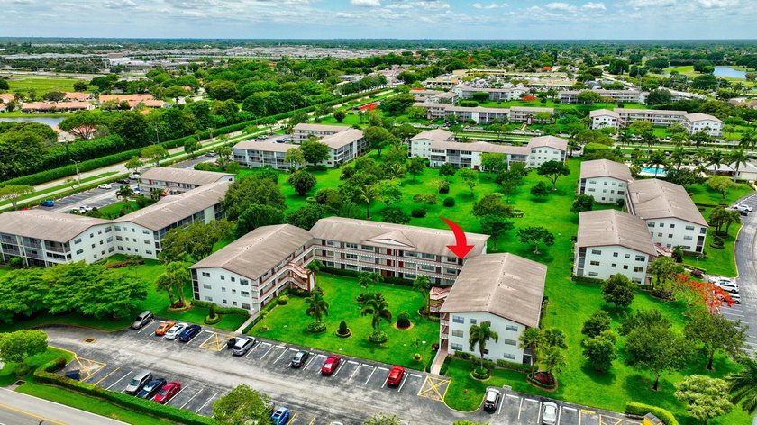 Located on the third and top floor with no neighbors above and - photo 50