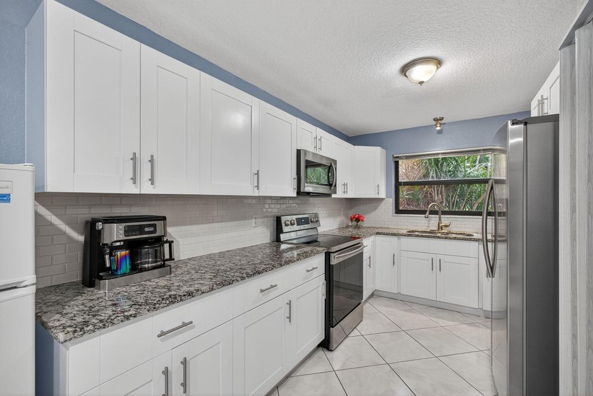 Welcome to this beautifully updated home featuring a New Roof - photo 14