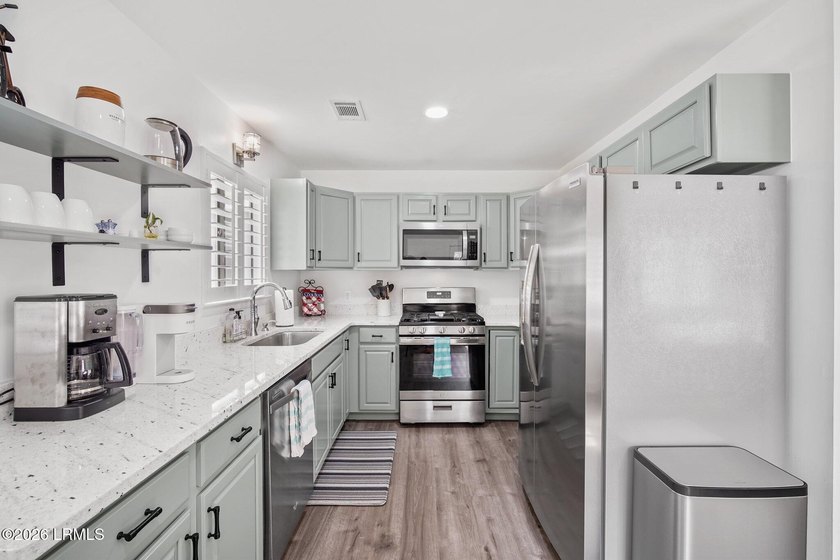 Located in Pigeon Point, this thoughtfully renovated 3-bedroom - photo 8