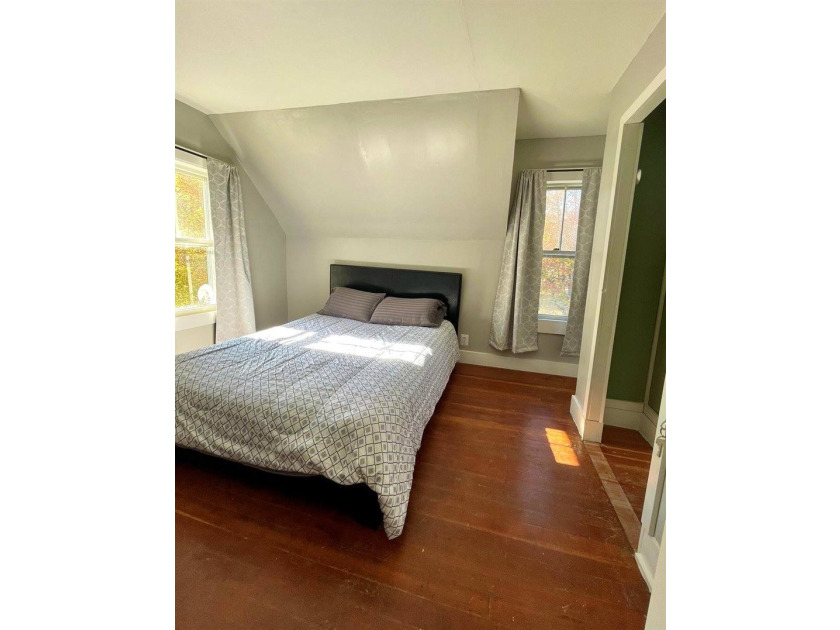 Step into this cozy 2-bedroom, 1.5-bath New Englander, where - photo 17