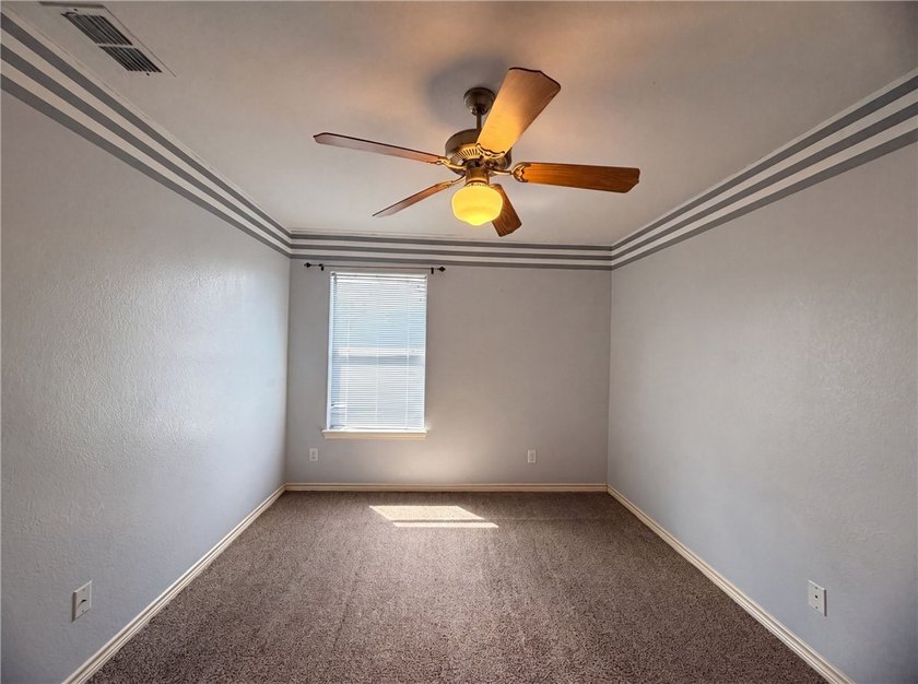 This Corpus Christi two-story home offers a patio, and a two-car - photo 12