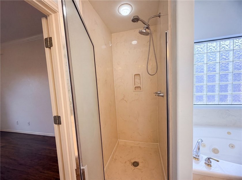 This Corpus Christi two-story home offers a patio, and a two-car - photo 16