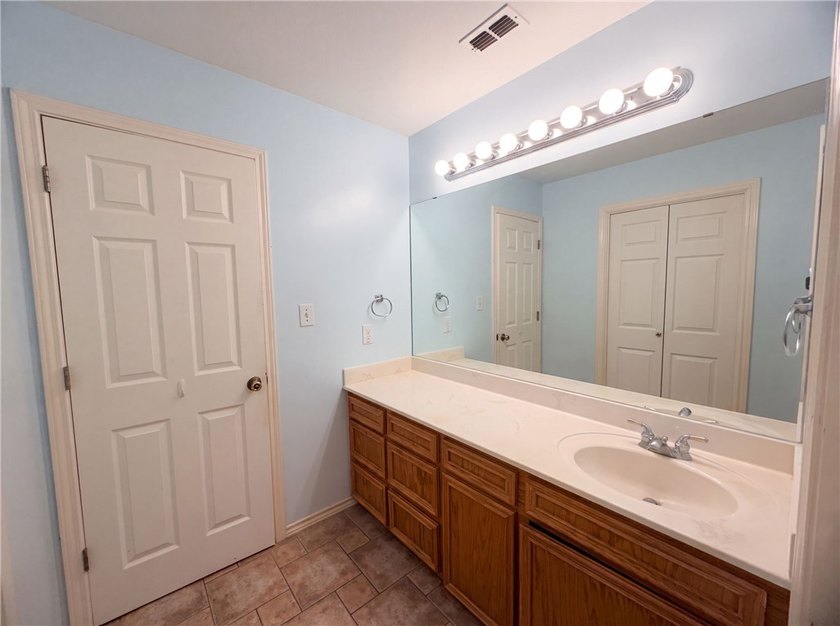 This Corpus Christi two-story home offers a patio, and a two-car - photo 17
