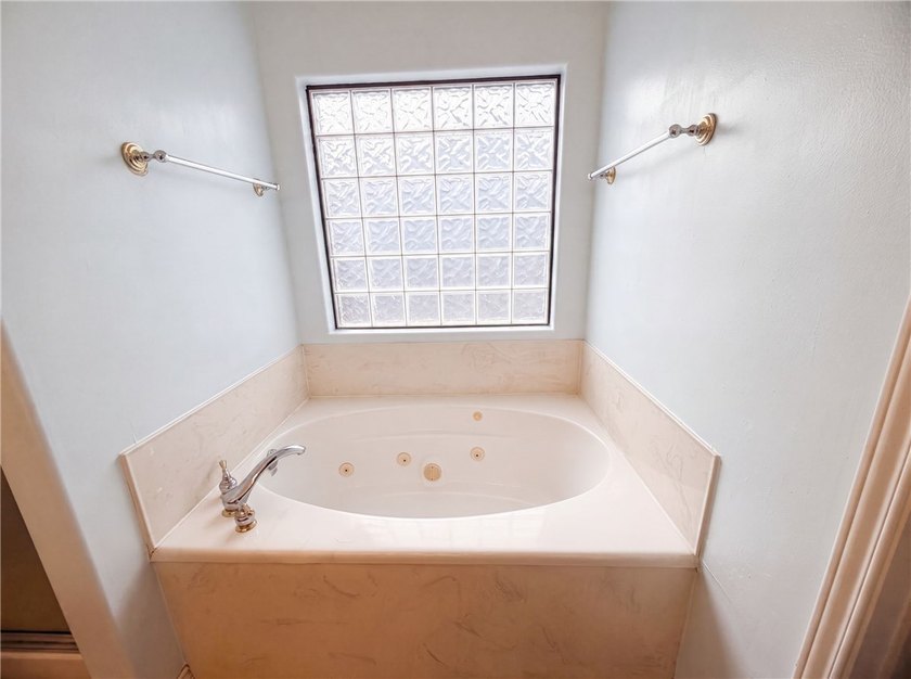 This Corpus Christi two-story home offers a patio, and a two-car - photo 18
