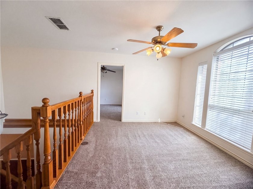 This Corpus Christi two-story home offers a patio, and a two-car - photo 21