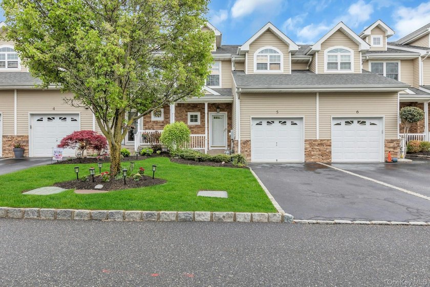 Tucked within the heart of vibrant Patchogue Village, this - photo 2
