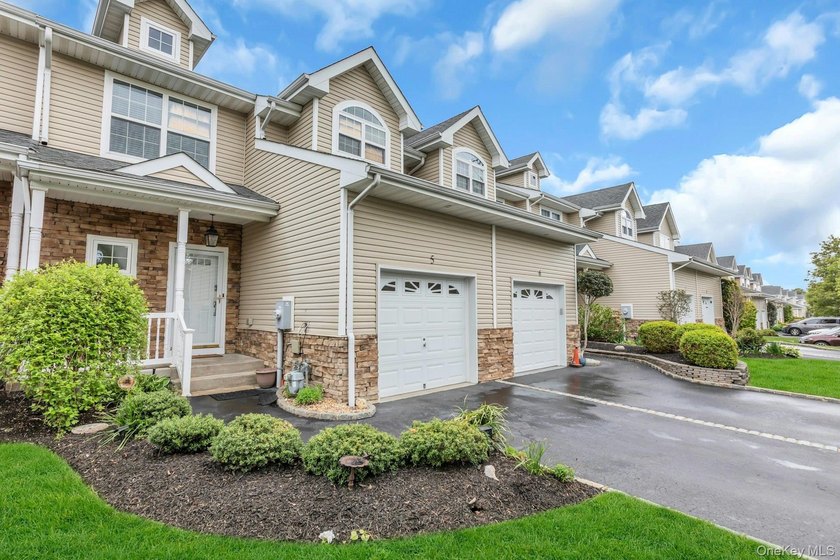 Tucked within the heart of vibrant Patchogue Village, this - photo 4