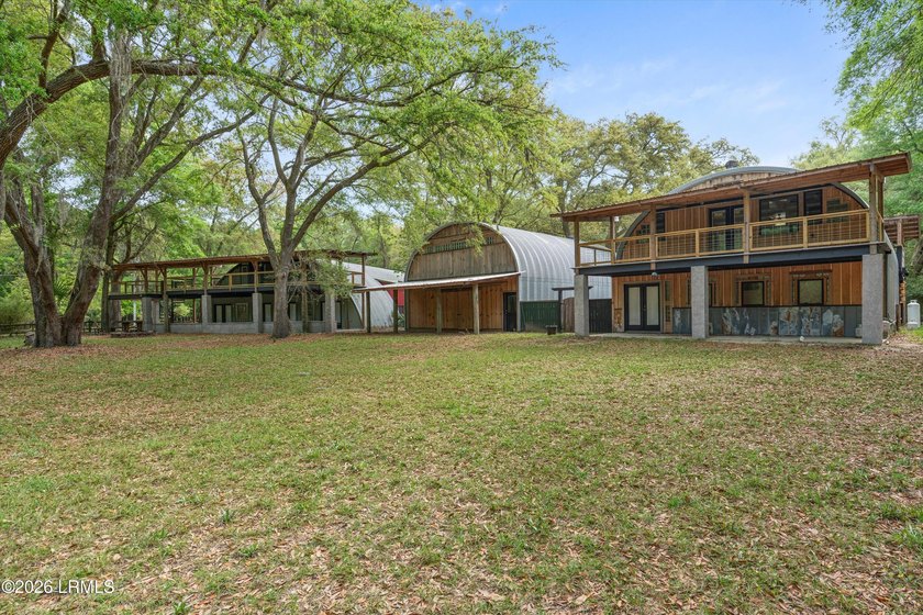 Tucked away down a quiet dirt road on 4.83 private acres on - photo 7