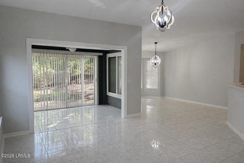 Light-filled one-level end unit in Sun City, tucked away on a - photo 8