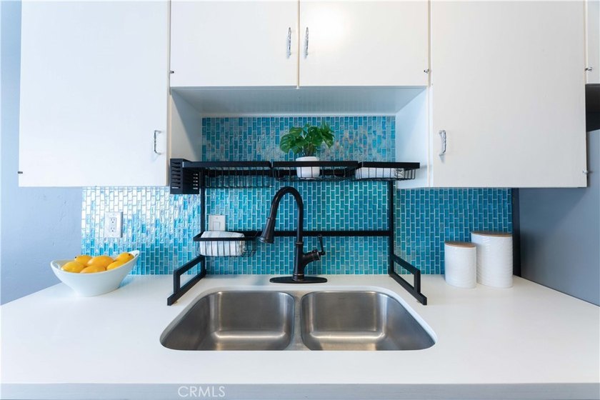 This stylish 1-bedroom, 1-bathroom condo in The Royal Palms is - photo 11