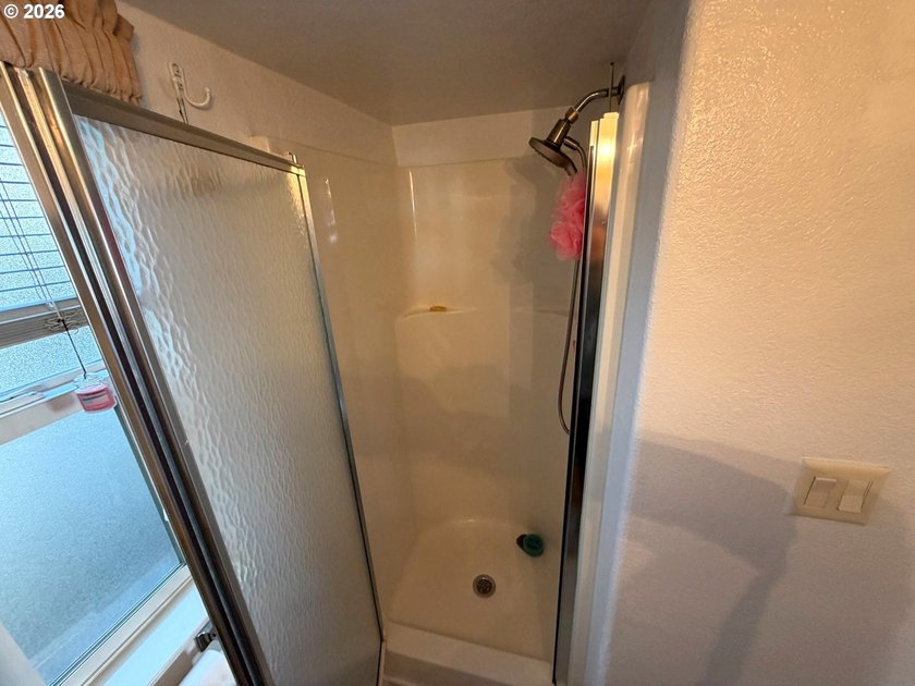 Updated 2004 park model located in the 55+ Chetco RV Park. This - photo 10