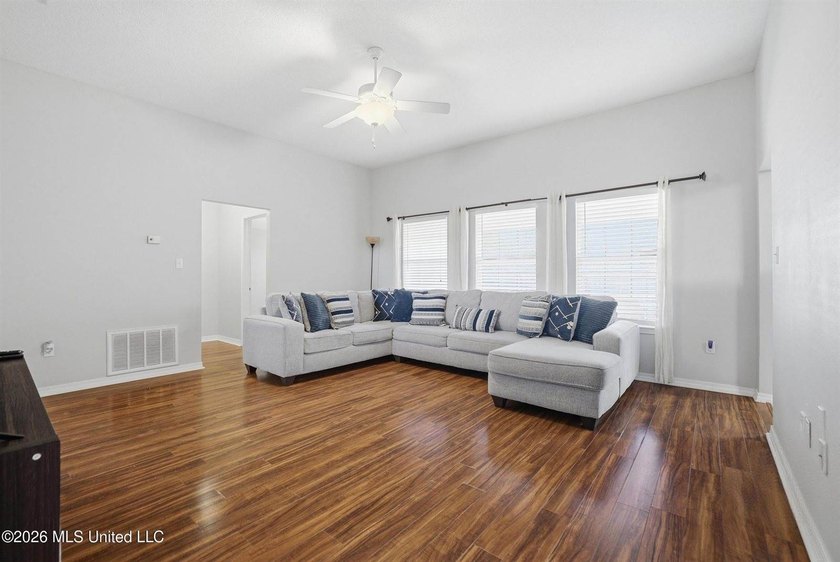 This beautiful brick home is located in a quiet subdivision with - photo 3