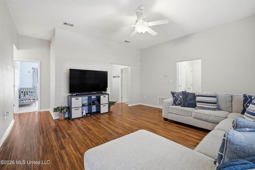 This beautiful brick home is located in a quiet subdivision with - photo 4