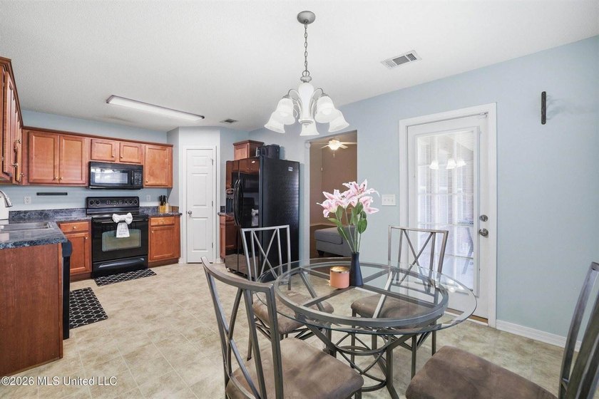 This beautiful brick home is located in a quiet subdivision with - photo 7