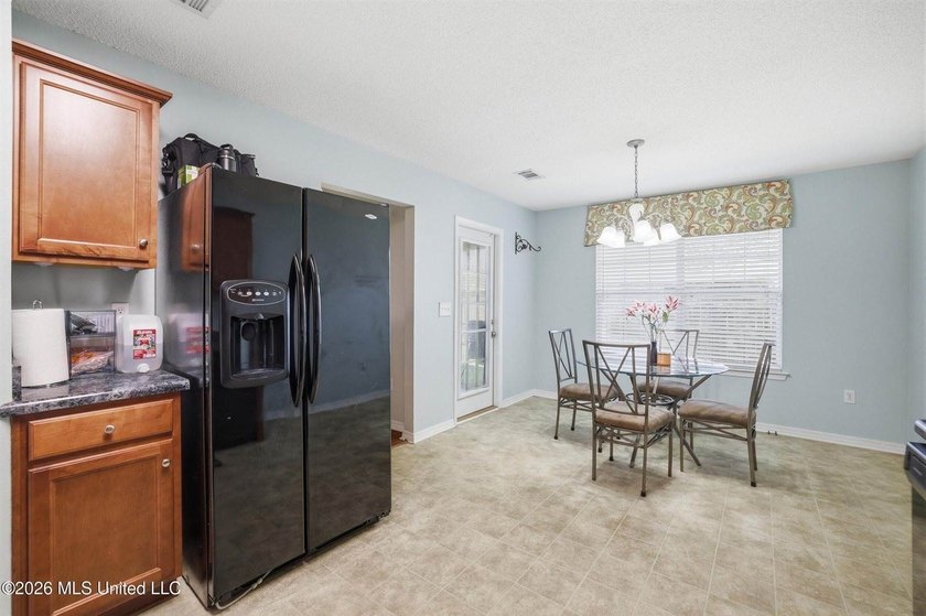 This beautiful brick home is located in a quiet subdivision with - photo 9