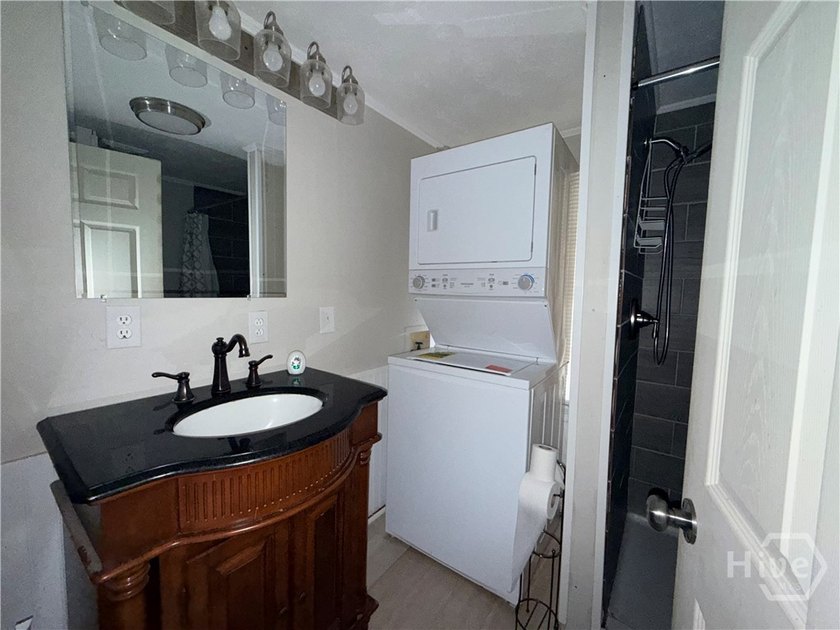 Welcome to this two bedroom, one bath home nestled on a generous - photo 12