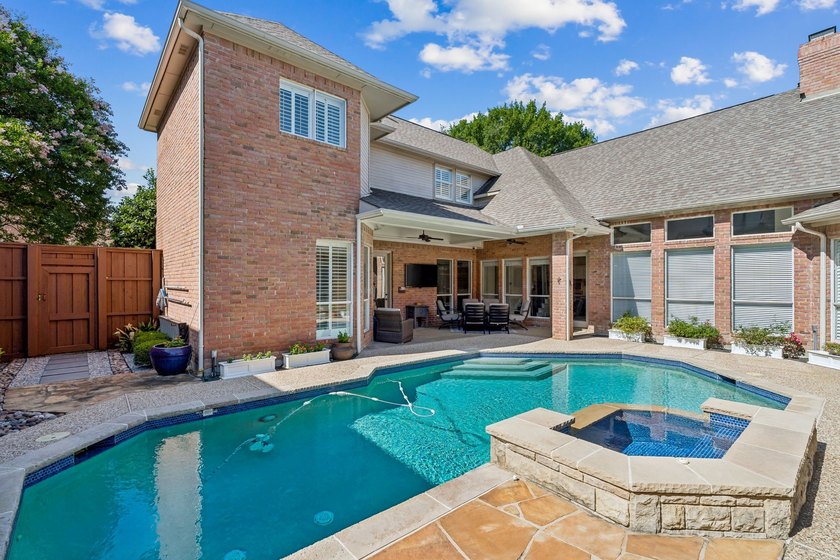 Welcome to this stunning two-story brick home nestled in the - photo 34