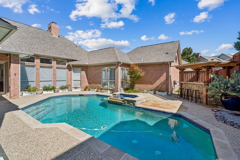 Welcome to this stunning two-story brick home nestled in the - photo 36