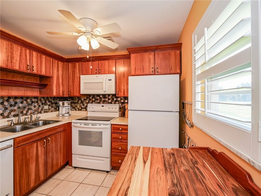 Enjoy the best of 55+ living in this beautifully maintained 2/2 - photo 8