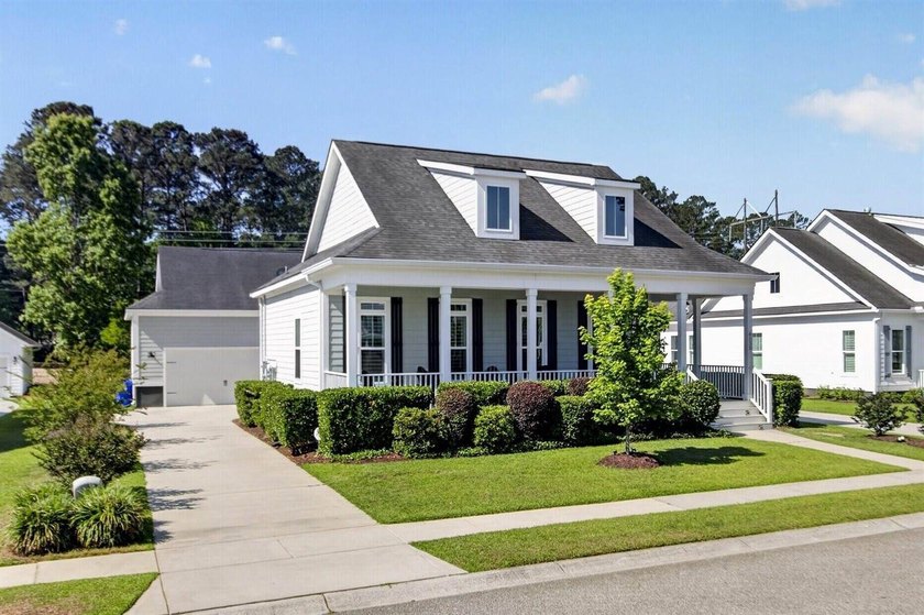 Welcome to this beautifully maintained 4 bedroom, 3.5 bath home - photo 2