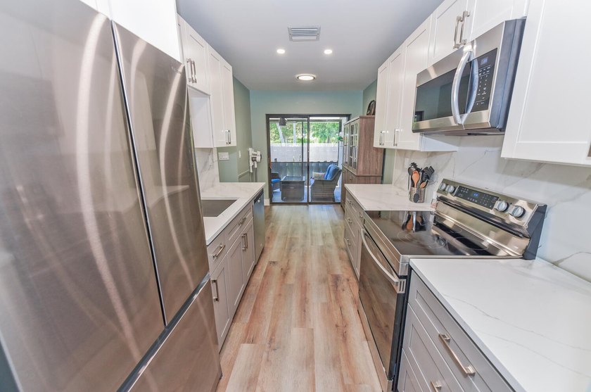 Experience modern luxury and a resort-style lifestyle in this - photo 20