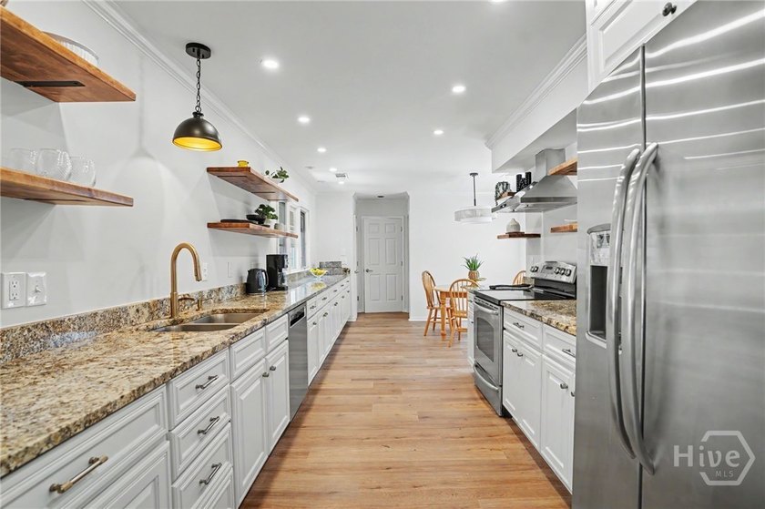 Beautifully reimagined and move-in ready, this updated 3-bedroom - photo 11