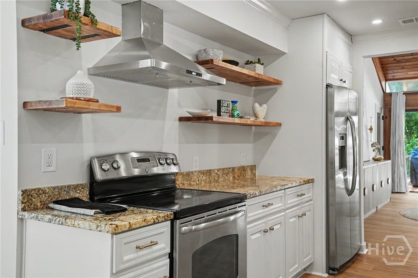 Beautifully reimagined and move-in ready, this updated 3-bedroom - photo 13