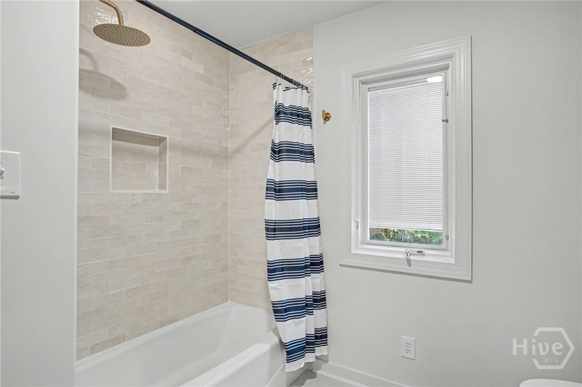 Beautifully reimagined and move-in ready, this updated 3-bedroom - photo 25
