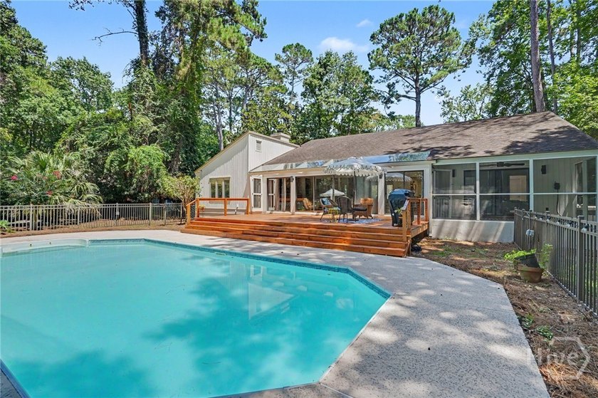 Beautifully reimagined and move-in ready, this updated 3-bedroom - photo 32