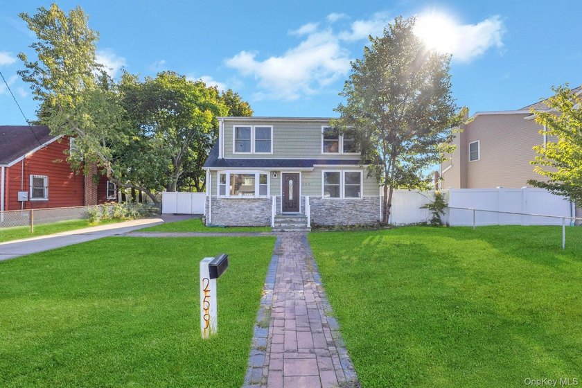 Welcome to this beautifully updated 4-bedroom dormered Cape - photo 2
